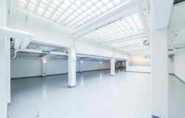 Spacious minimalist venue at The Vinyl Factory Soho for conferences and exhibitions.